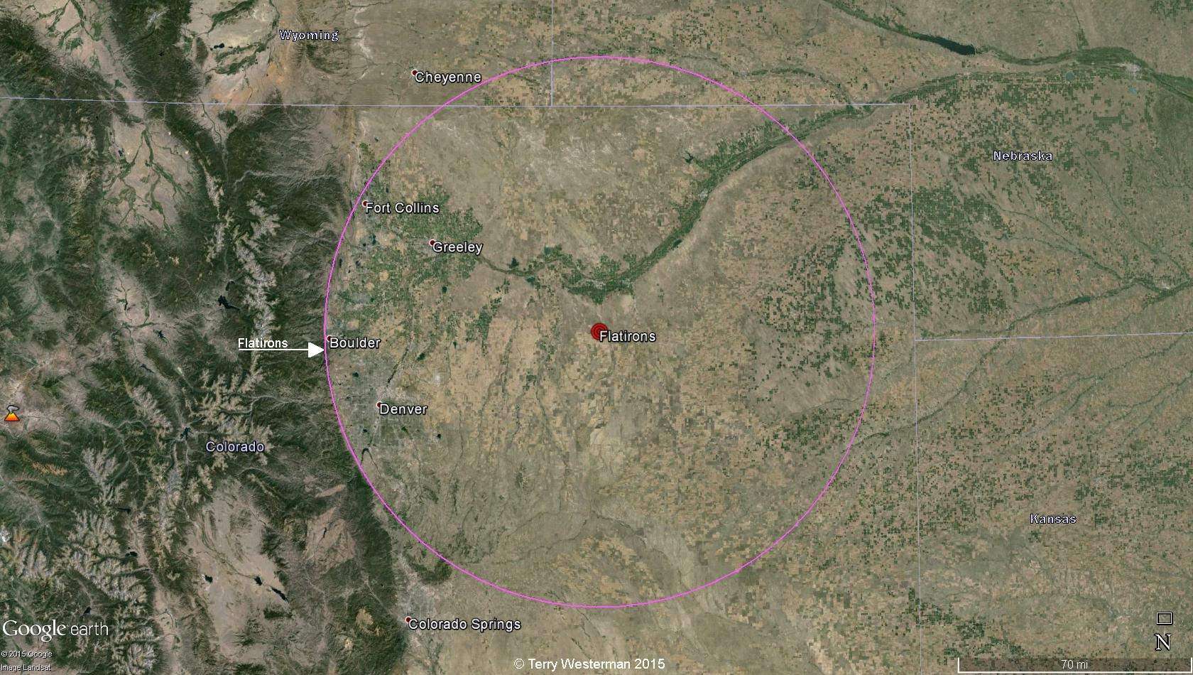 The Flatirons Meteor Impact was centered at  40° 3'6.95"N 103°47'9.53"W. The 80 mile radius seismic circle of the impact formed the circular arc of the Front Range in Colorado.